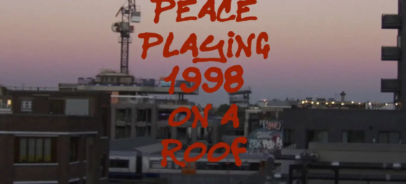 Screenshot from Peace Playing 1998 On A Roof © 2019