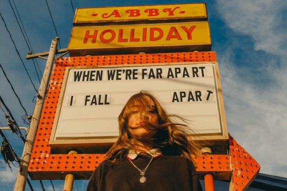 WHEN WE'RE FAR APART I FALL APART - Abby Holliday