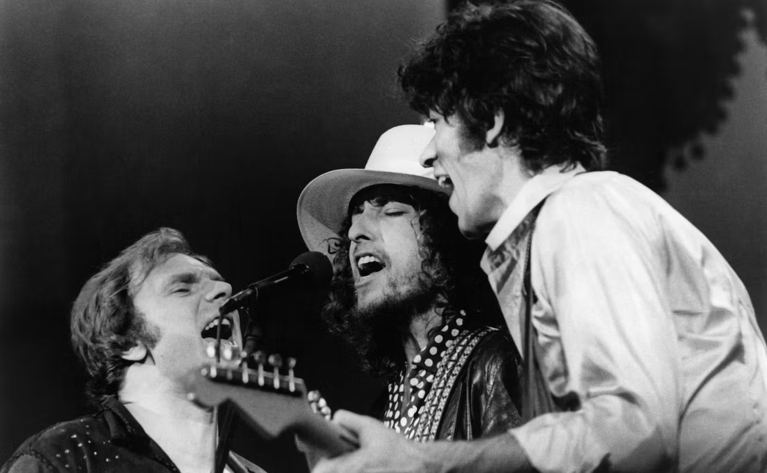 Dylan with Van Morrison (L) and Robbie Robertson (R) during the The Last Waltz. 1976. With permission from Heute.at