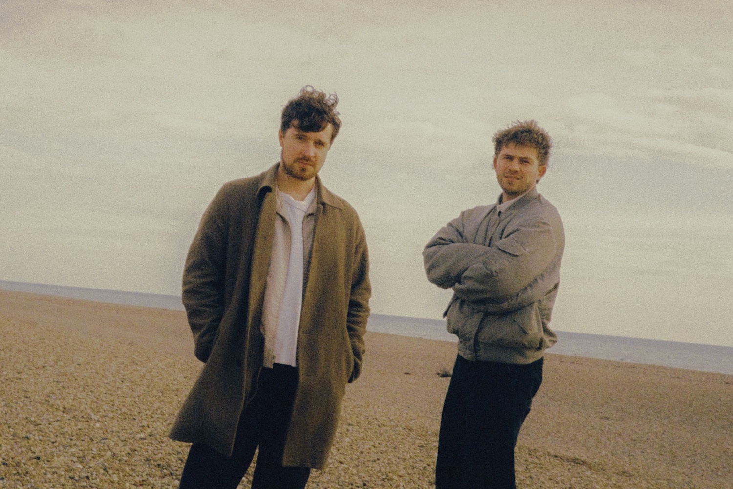 “Arms Out Wide Like an Aeroplane”: Aquilo Capture Love's Sweetness on “Under My Skin,” a Sun-Kissed Indie Pop Daydream